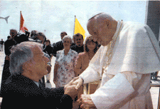 Dennis Mills subordinates Canadian Charter rights to the authority of the Vatican (Photo from the cover of a Fall 2002 newsletter issued by Dennis Mills)